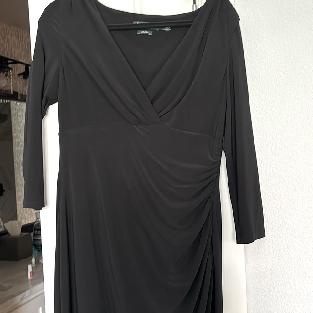 Size 12 Ralph Lauren long sleeve black dress. Worn once. Front slit.